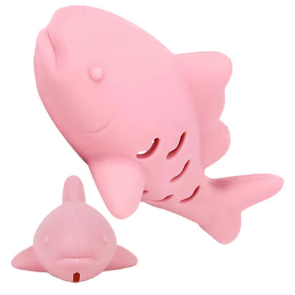 Poisson distributeur de friandises et nettoyant dentaire