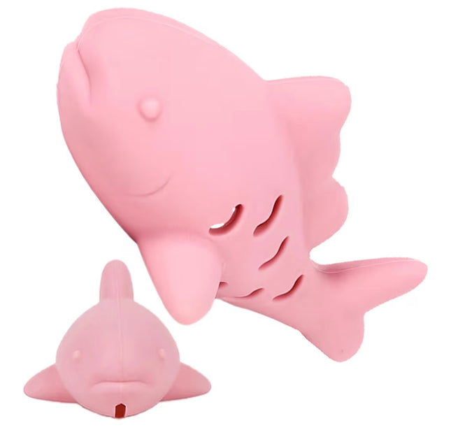 Poisson distributeur de friandises et nettoyant dentaire