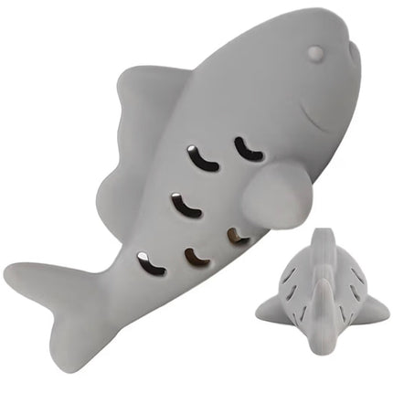 Poisson distributeur de friandises et nettoyant dentaire