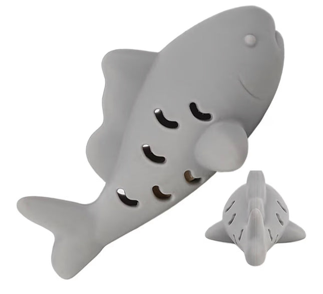 Poisson distributeur de friandises et nettoyant dentaire